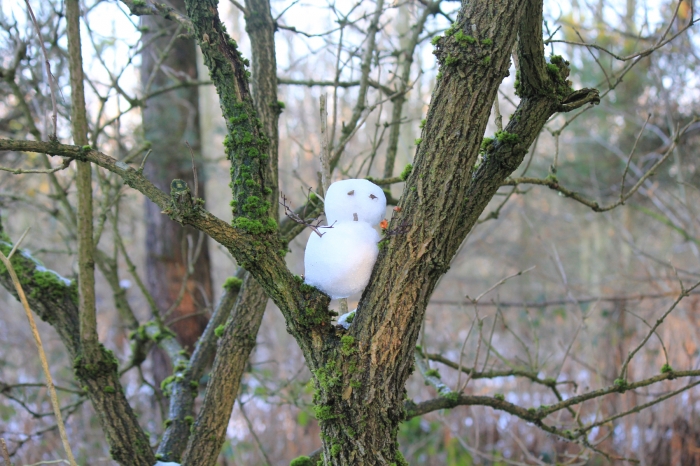 Snowman in a tree