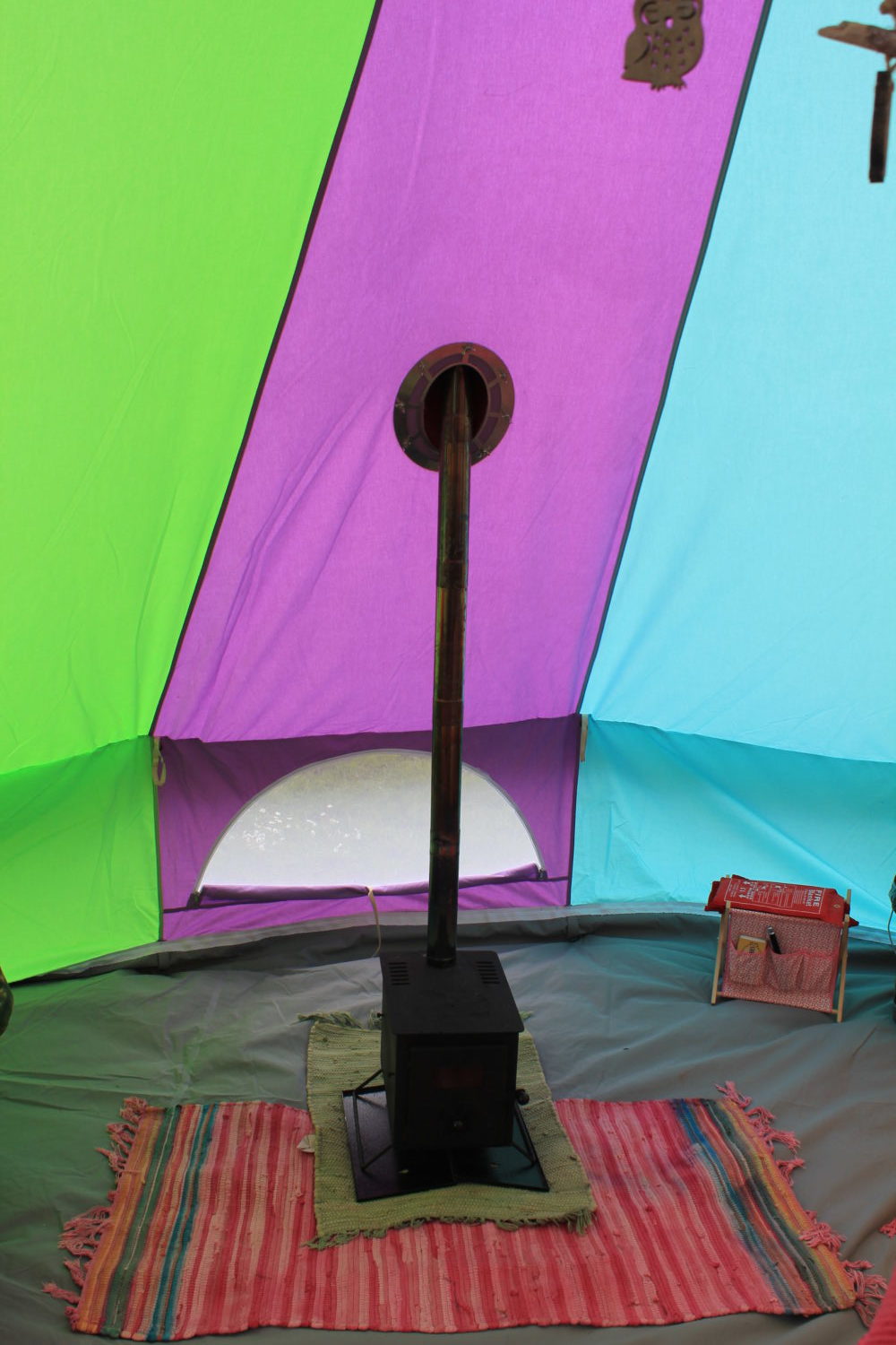 Bell tent with wood burning stove fitted