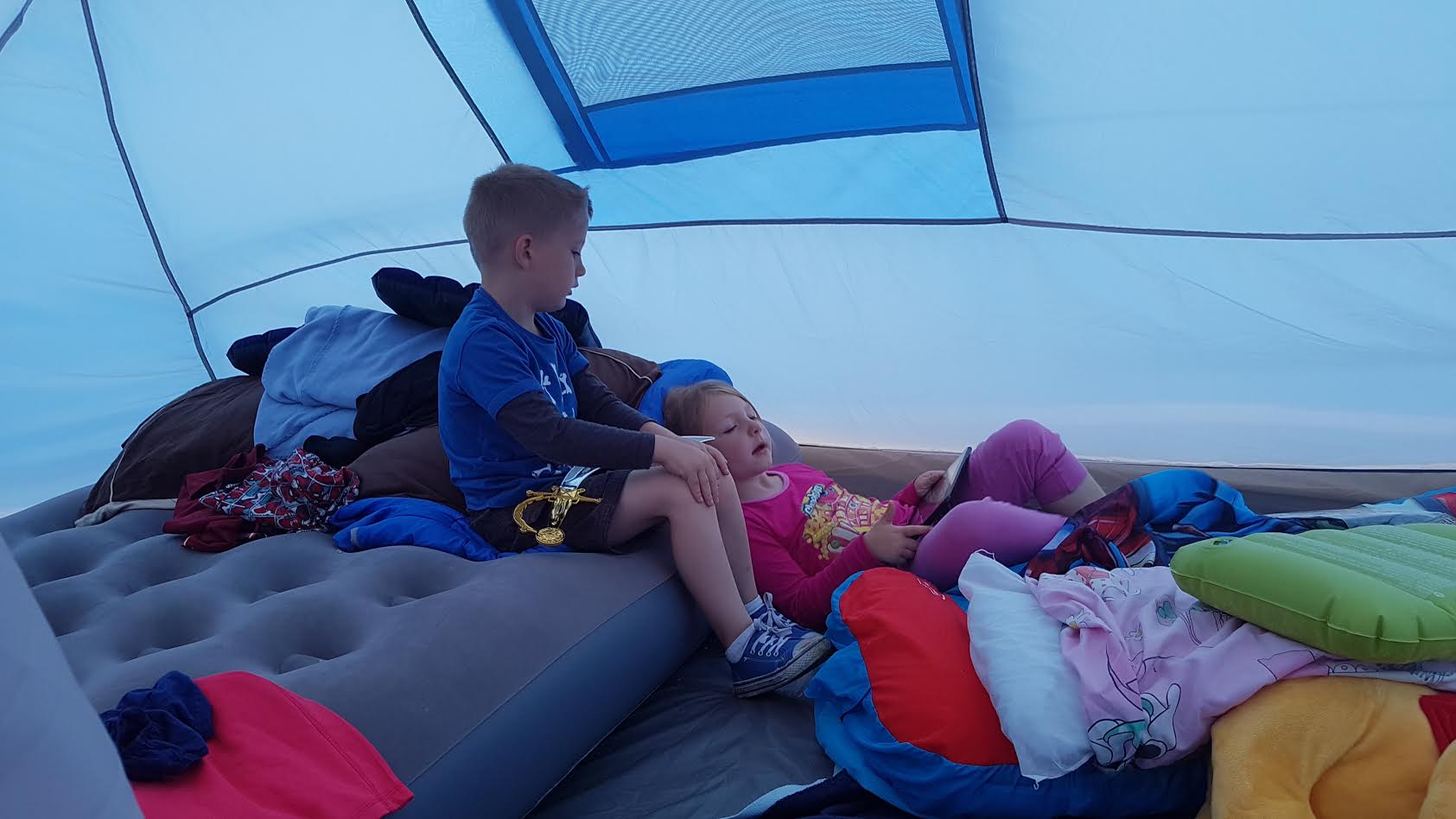 Children inside tent camping