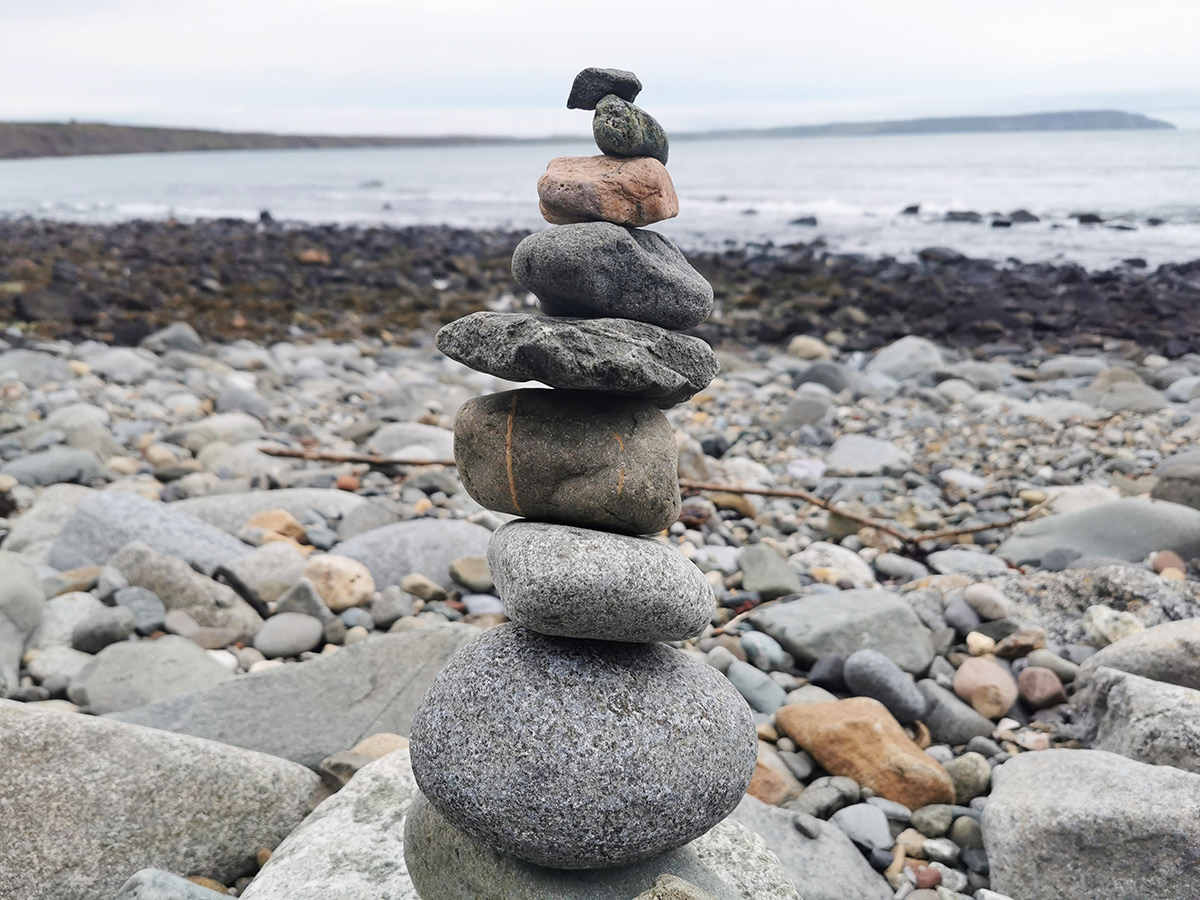 Stacking stones on the beach