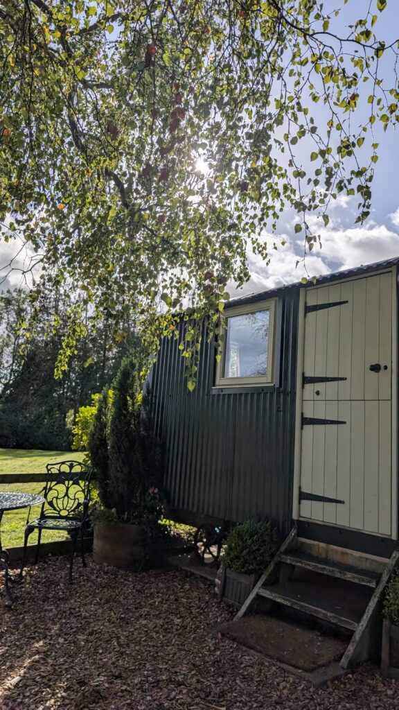 Exterior shot of Hay & Hedgerow Glamping in Shropshire, shepherd's hut review